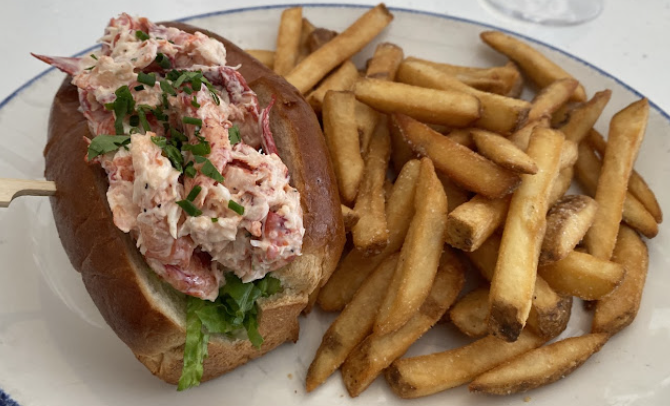 The Mooring Seafood Kitchen and Bar signature dishes Blackbird Farm's BurgerLobster RollClassic Mooring Clam Chowder